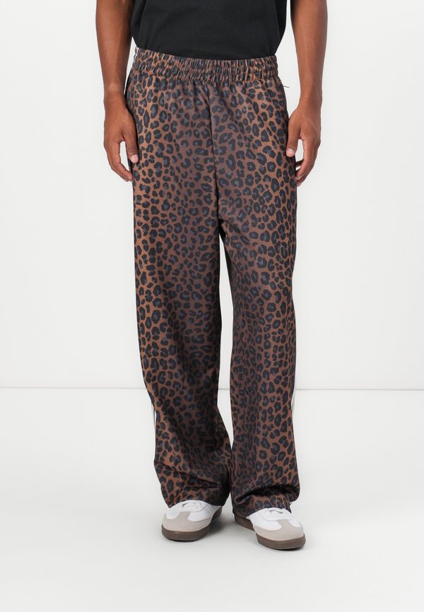 adidas Originals UNISEX - Tracksuit bottoms - bronze coloured