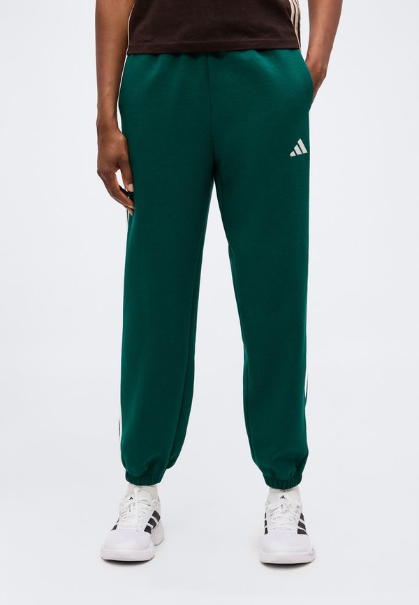 adidas Sportswear ESSENTIALS 3 STRIPES LOOSE PANTS - Tracksuit bottoms - collegiate green/ivory