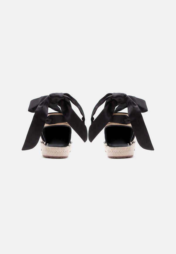 DKNY MADELISE TIE UP FLAT