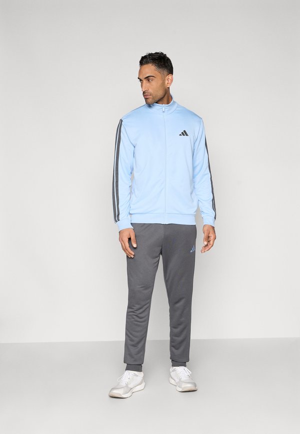adidas Sportswear 3 STRIPES - Tracksuit - glow blue