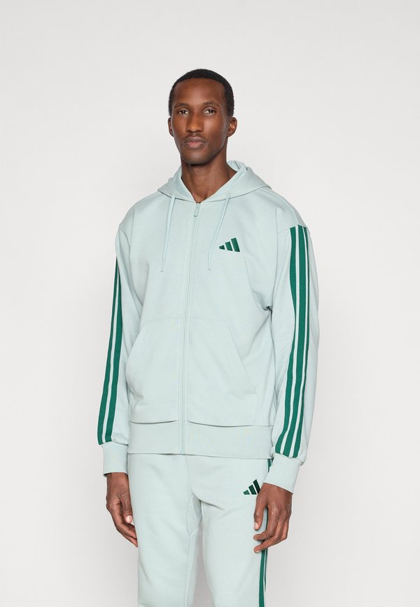 adidas Sportswear ESSENTIALS THREE STRIPES FRENCH TERRY FULLZIP - Zip-up sweatshirt - sage/collegiate green