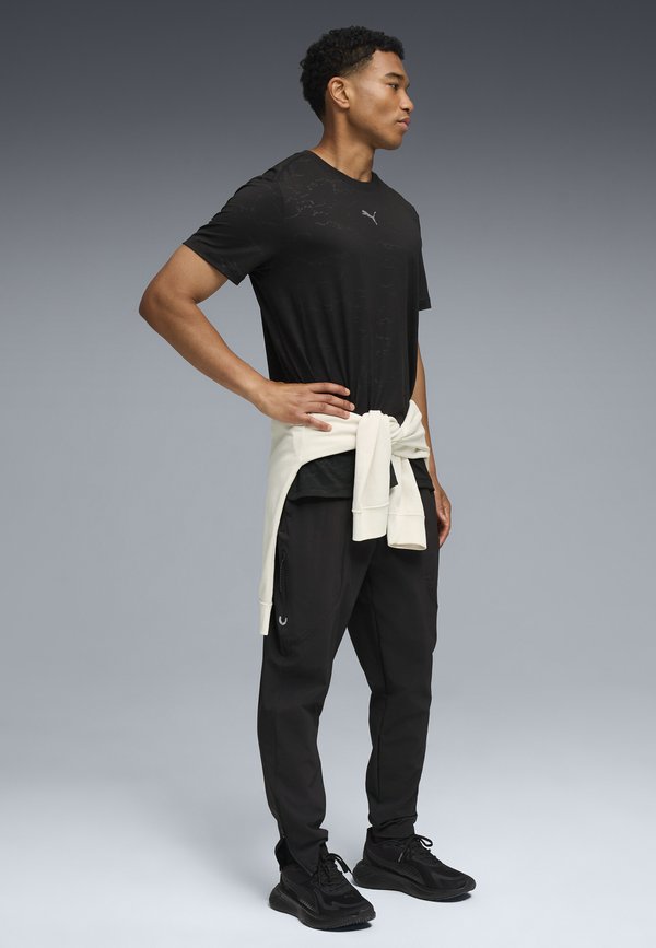 Puma Tracksuit bottoms - black