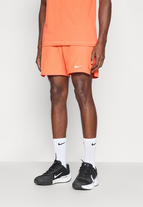 Nike Performance NIKECOURT VICTORY SHORT - Sports shorts - turf orange/white